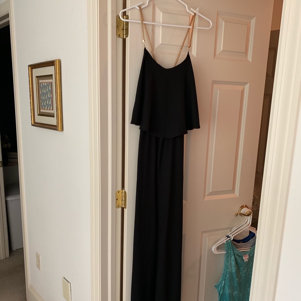 Jump suit with gold chain straps
